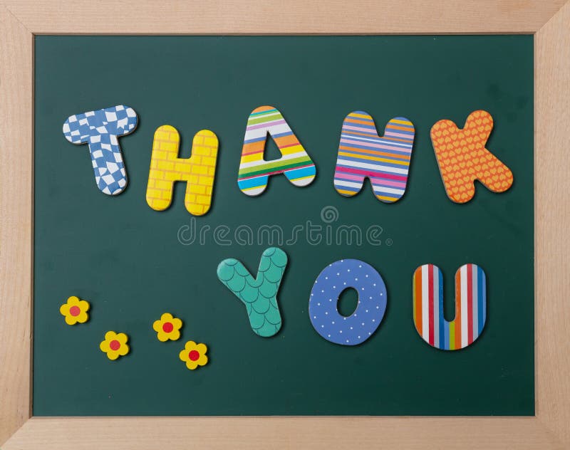 Thank you, Colorful letters shaping the word thank you on green board with wooden frame. Thank you, Colorful letters shaping the word thank you on green board with wooden frame