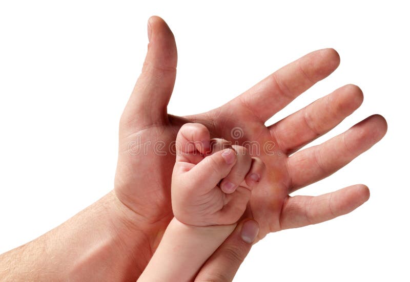 Las manos de padre e hijo imagen de archivo libre de regalías