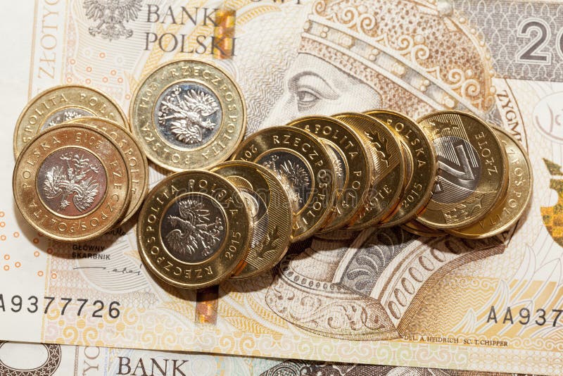 Las monedas polacas que mienten en el papel firman Polonia imágenes de archivo libres de regalías Las monedas polacas que mienten en el papel firman Polonia imágenes de archivo libres de regalías