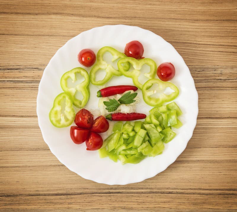 Las pimientas de chiles, los tomates de cereza, la paprika, la cebolla y el apio se van fotos de archivo Las pimientas de chiles, los tomates de cereza, la paprika, la cebolla y el apio se van fotos de archivo