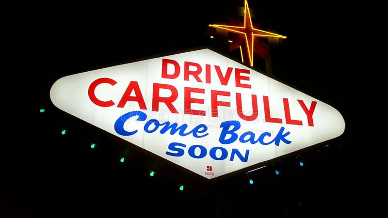 Drive carefully, come back soon as Las Vegas sign on the Las Vegas Strip in Las Vegas, dark night sky, Nevada, USA. sin city