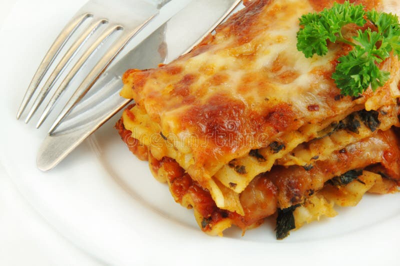 Lasagna Close up with Fork and Knife