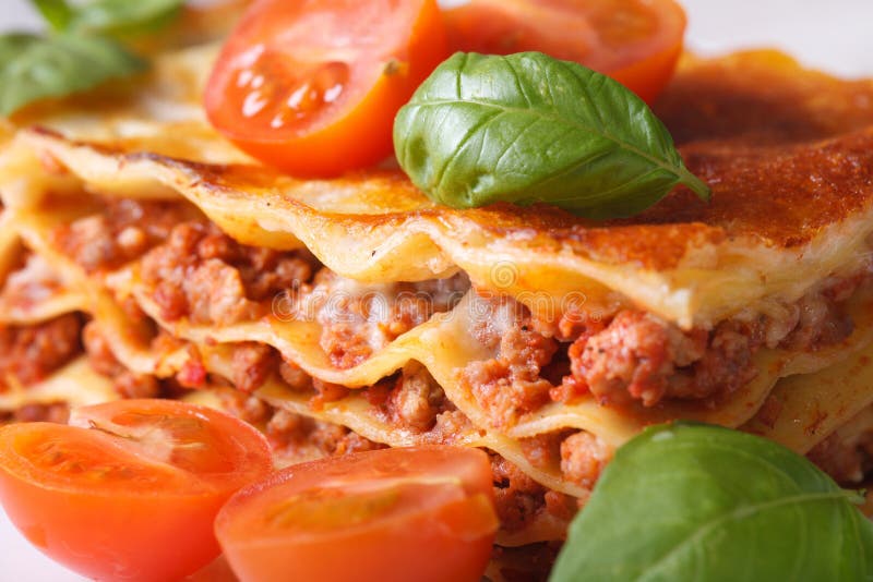 Lasagna with Fresh Basil and Tomatoes Macro Horizontal Stock Image