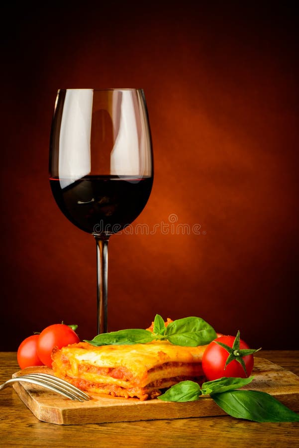 Lasagna and red wine stock image. Image of still, tasty 25114517