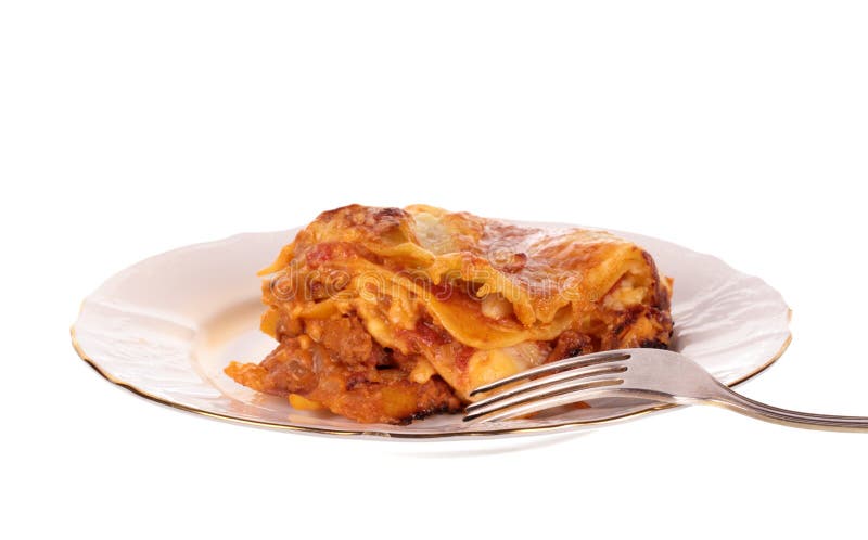 Lasagna i platta royaltyfri foto Lasagna i platta royaltyfri foto