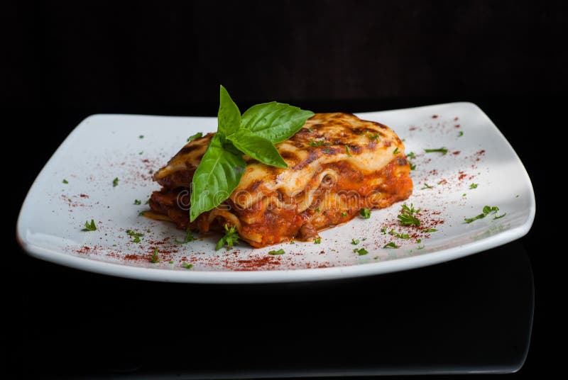 Lasagna on a Square White Plate Stock Photo Image of dinner, detail
