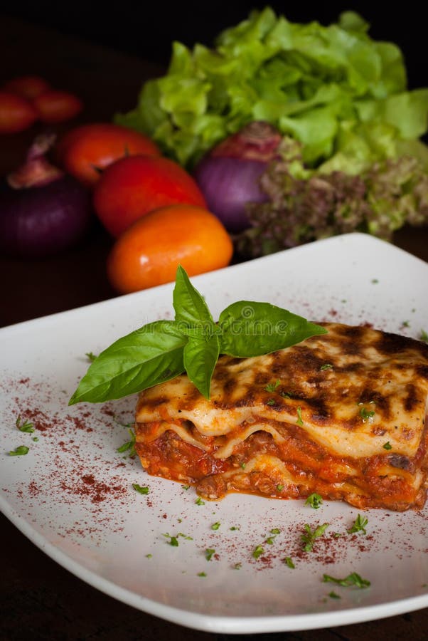 Lasagna On A Square White Plate Stock Photo Image of dinner, detail