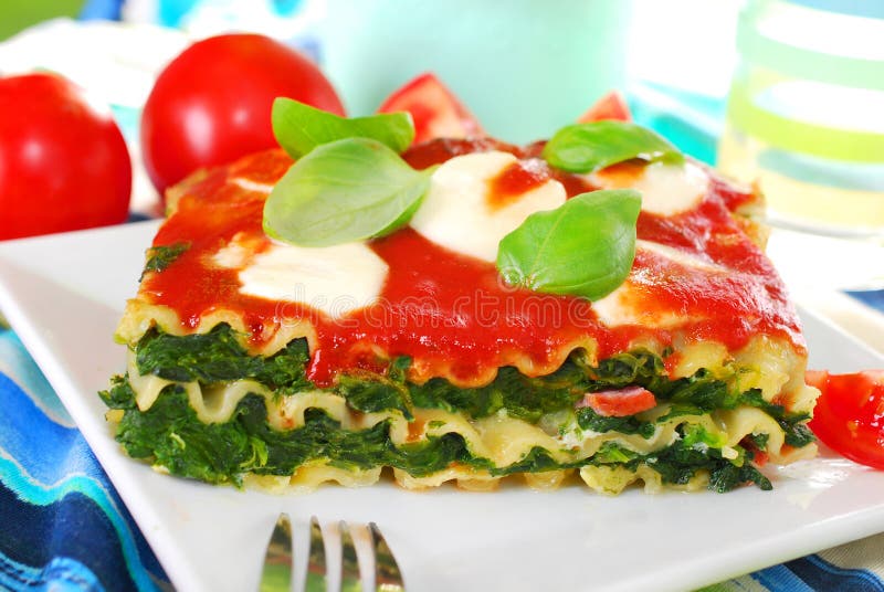 Lasagne with spinach and mozzarella stock image