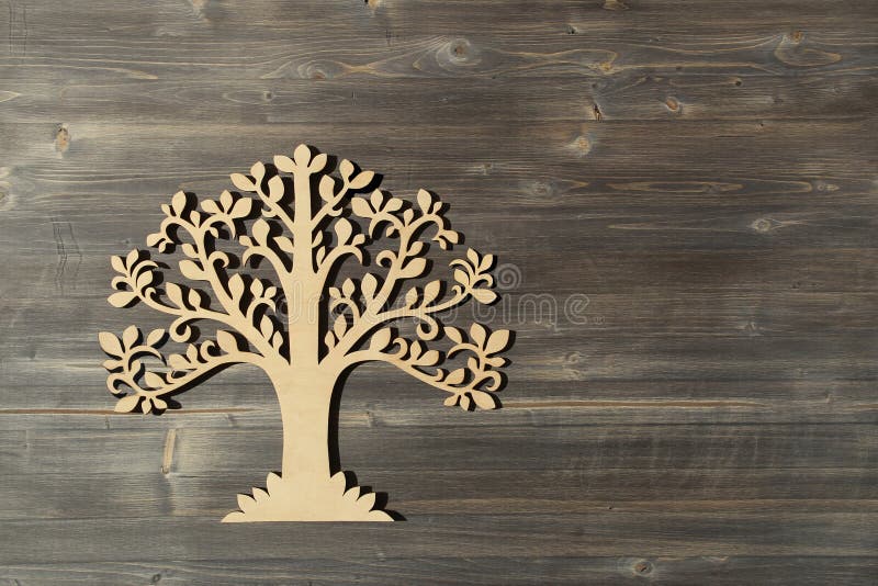 Laser Cut Wood Tree Ornament on Wooden Background. Stock - of wooden, plank: 176678987