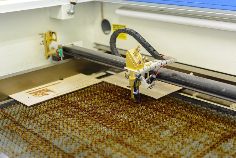 Laser Engraver, Laser Burning on Wood Stock Photo Image of business