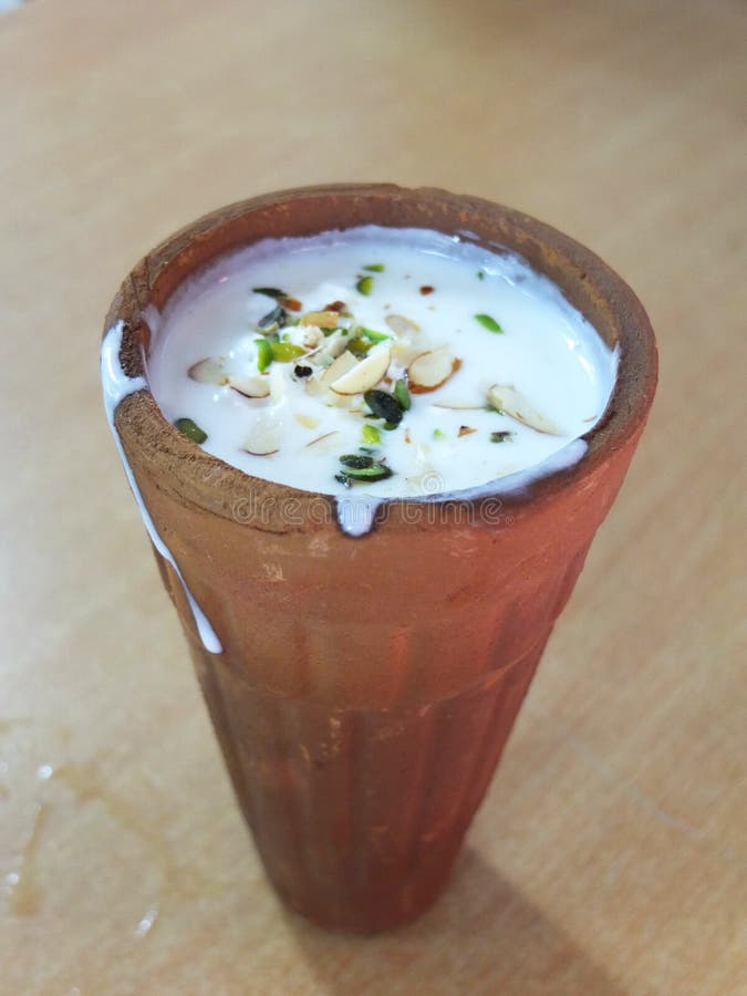 lassi clay glass breakfast useful dessert yogurt lassi glass wine peppered pistachios 105565023