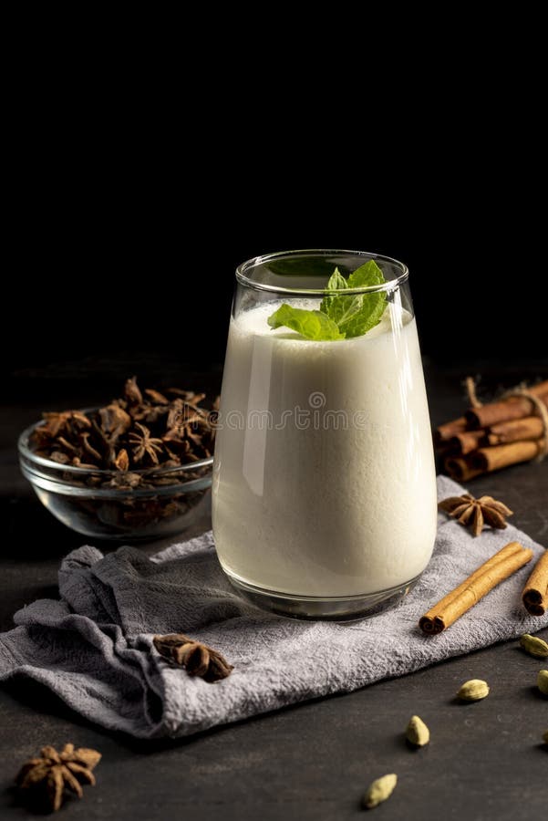 Lassi, Lassie Indian Yogurt Drink with Spice on White Background