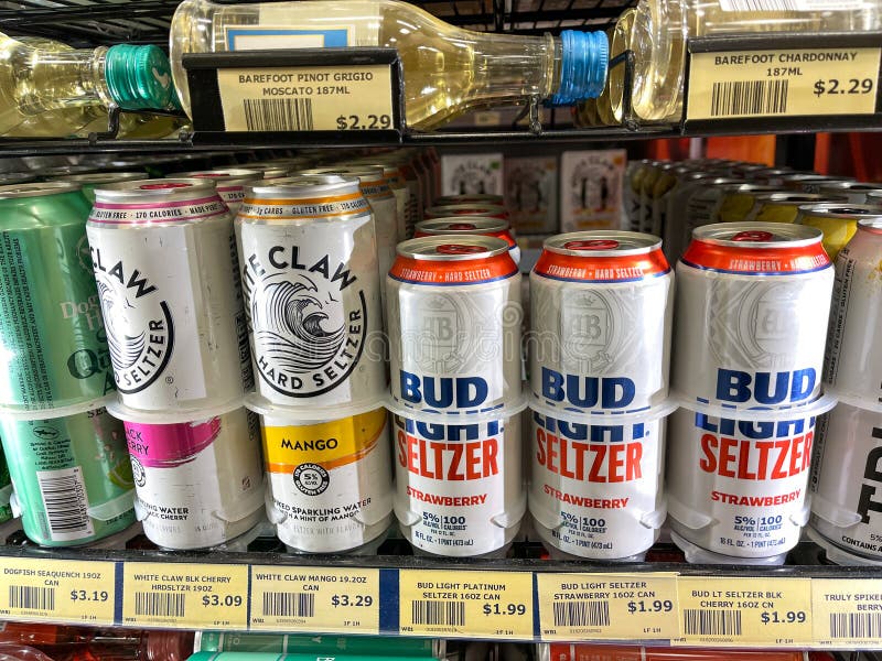 Orlando,FL USA - January 30, 2021: Cans of Bud Light Seltzer and White Claw alcohol beverages in a refriderator case at a Wawa store. Orlando,FL USA - January 30, 2021: Cans of Bud Light Seltzer and White Claw alcohol beverages in a refriderator case at a Wawa store