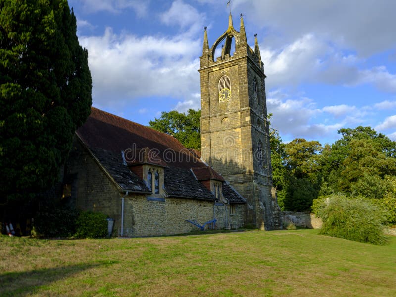 Late afternoon summer light on All Hallow's Church at Tillington next to the Petworth Estate in the South Downs National Park, stock image Late afternoon summer light on All Hallow's Church at Tillington next to the Petworth Estate in the South Downs National Park, stock image