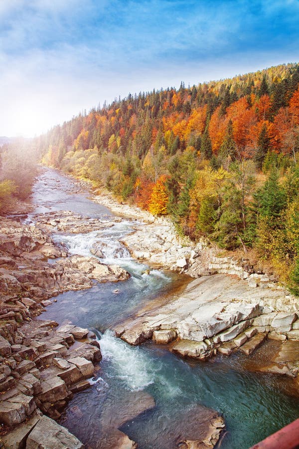 Late Autumn Landscape. Sormy mountain river with stones in the mountains royalty free stock images Late Autumn Landscape. Sormy mountain river with stones in the mountains royalty free stock images