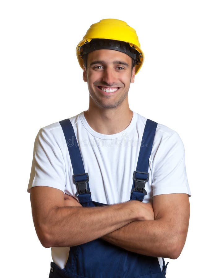 Latin construction worker with crossed arms royalty free stock image