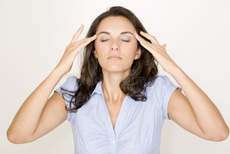 Latin woman suffering from headache