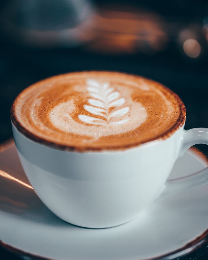 A Latte with a Leaf Art Design Stock Image - Image of latte, design