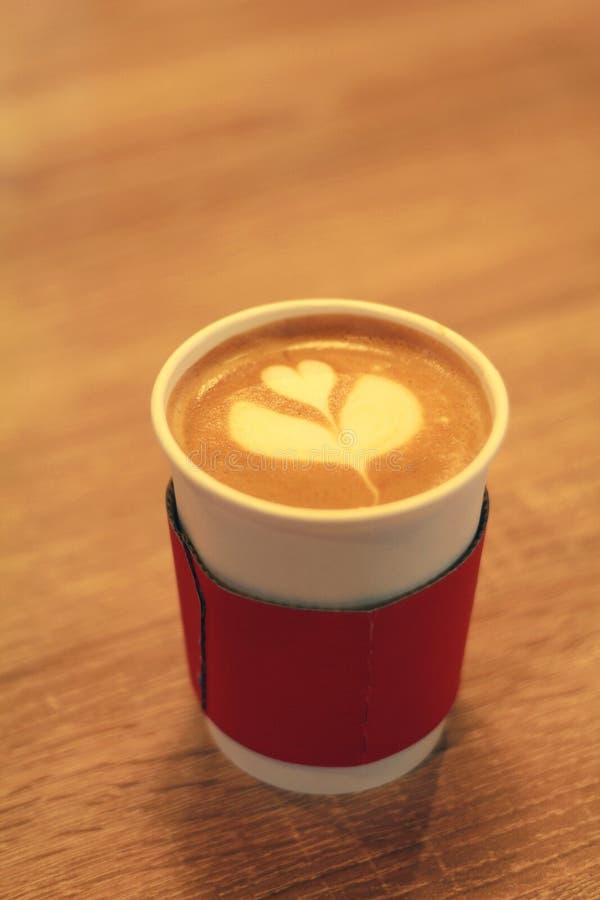 Latte in a takeaway cup stock image. Image of paper, cafe - 80942571