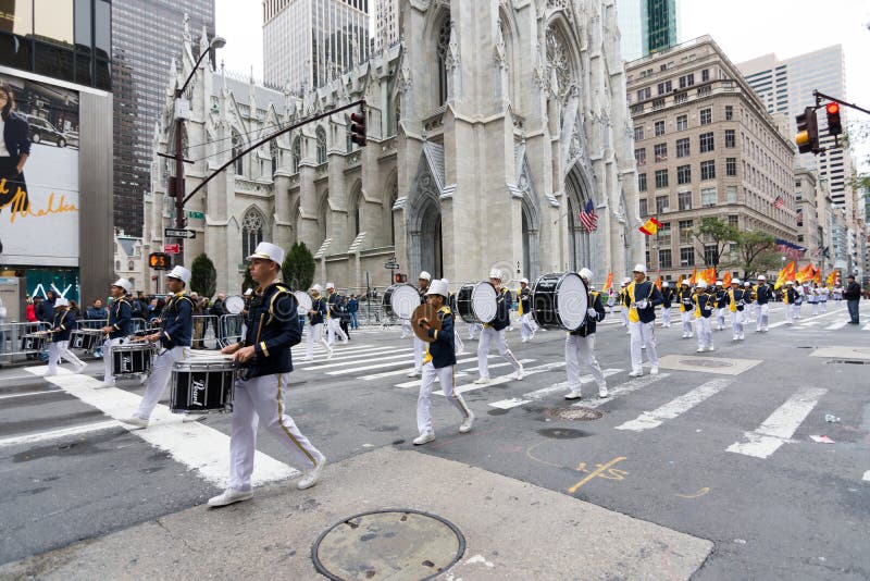 NEW YORK CITY - OCT. 9, 2016: People marching in the 2016 Hispanic Day Parade, part of the Hispanic National Heritage Month, on Fifth Avenue in Manhattan. New York City. NEW YORK CITY - OCT. 9, 2016: People marching in the 2016 Hispanic Day Parade, part of the Hispanic National Heritage Month, on Fifth Avenue in Manhattan. New York City