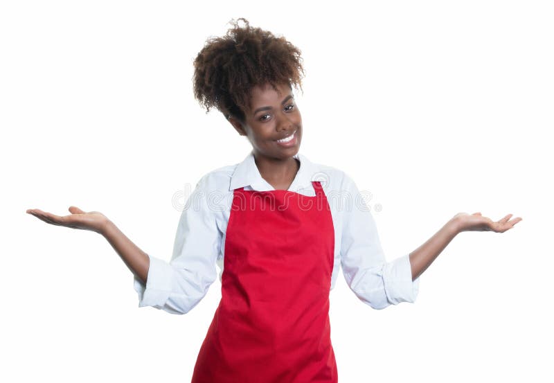 Laughing african american waitress with red apron inviting guests