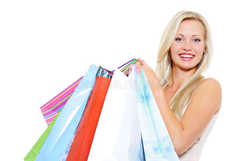 Laughing blond woman present shopping bags