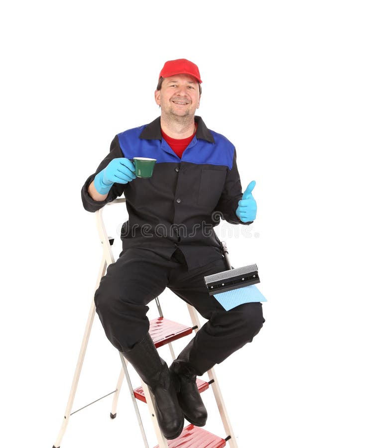 Laughing Cleaner Holding Cup of Coffee. Stock Photo Image of clean, blue 41640774