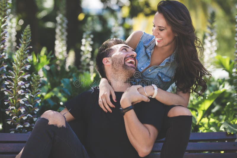 Laughing Couple Sitting Together Outside Having Fun Stock Image Image Of Horizontal Outdoors