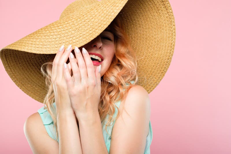 Laughing frolic woman sunhat summer fashion beauty royalty free stock photos Laughing frolic woman sunhat summer fashion beauty royalty free stock photos