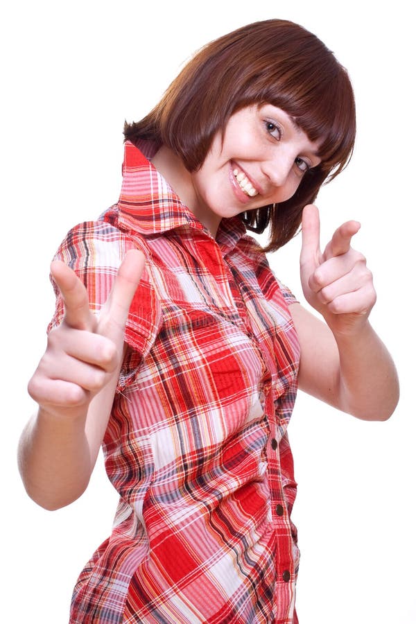 Laughing girl in a shirt giving thumbs-up
