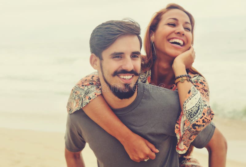 Laughing hippie love couple in vintage summer style stock image Laughing hippie love couple in vintage summer style stock image