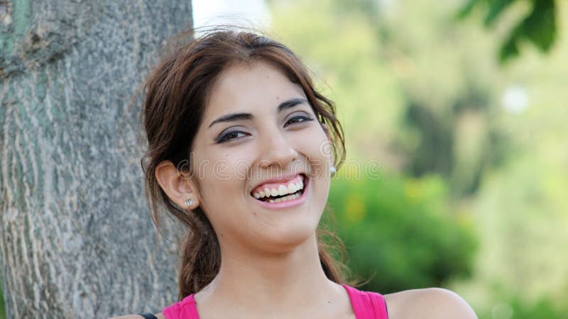 A Laughing Latina Female stock image. Image of excitement - 152535003