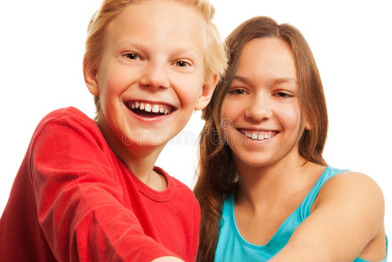 Laughing teen boy and girl