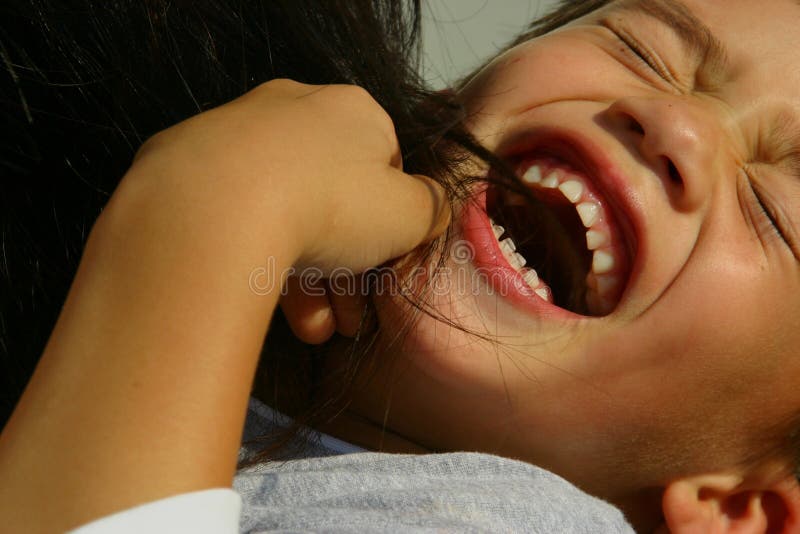 Laughing tickled boy