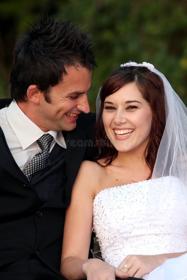 Laughing Wedding Couple royalty free stock images