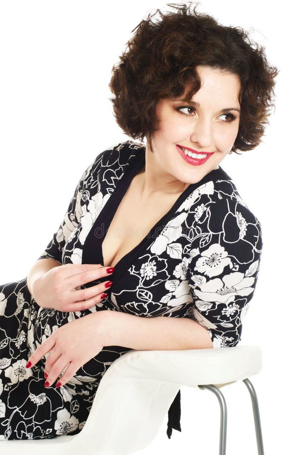 Laughing young woman with curly hair