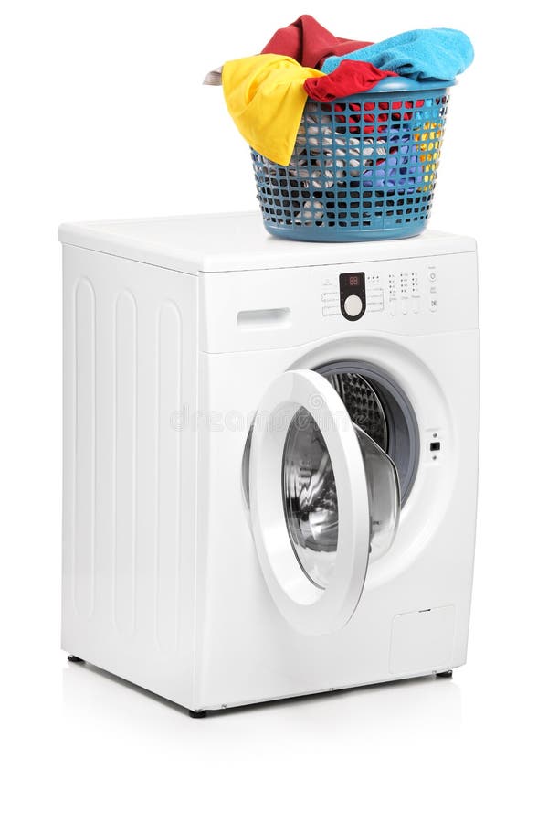 Laundry basket on a washing machine royalty free stock photography
