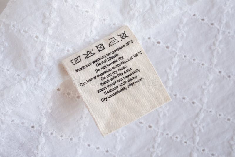 Laundry Care Washing Instructions Clothes Label On Fabric Texture ...