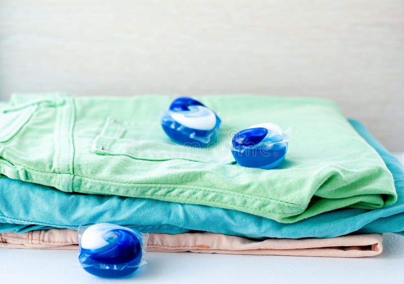 Laundry and Detergent Capsule Pod on Jeans Stock Photo Image of