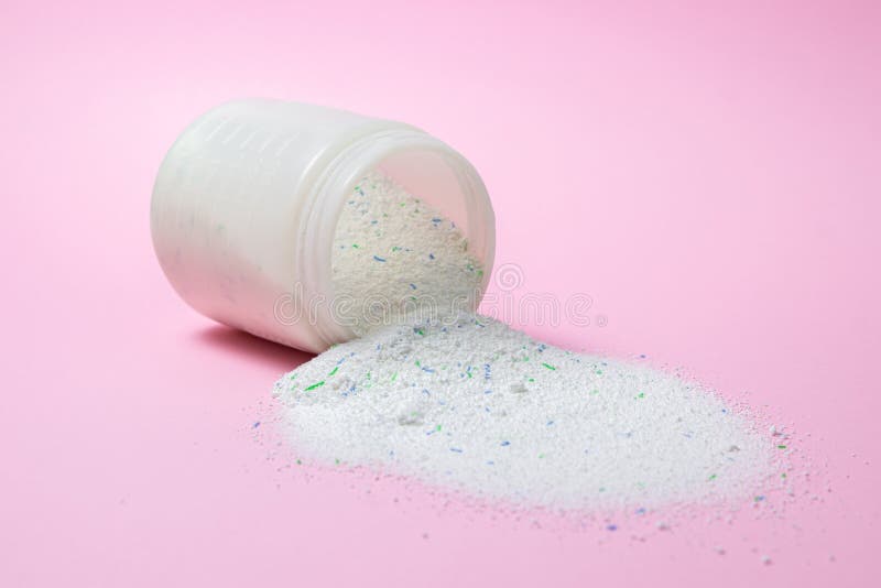 https://thumbs.dreamstime.com/b/laundry-detergent-pink-background-washing-powder-spilled-out-measuring-cup-household-chemicals-laundry-detergent-208888002.jpg