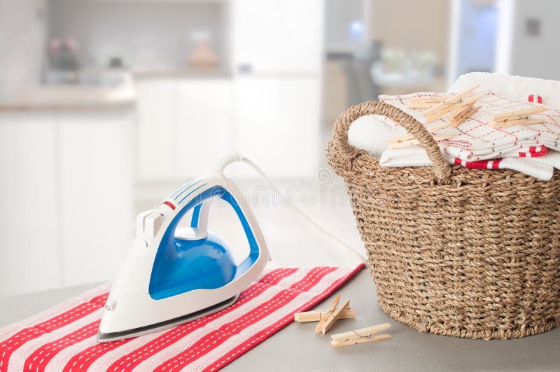 Laundry in Kitchen Setting stock photo. Image of iron 25280894