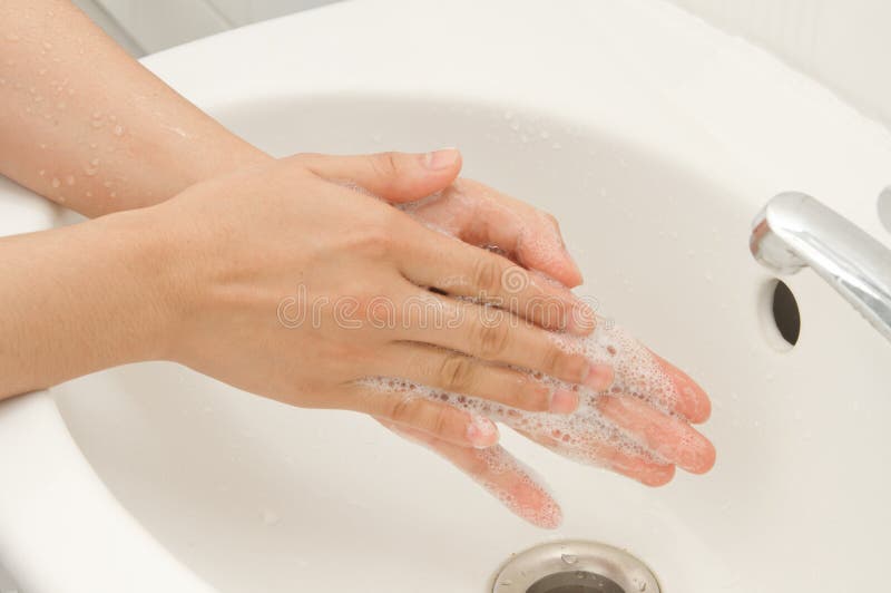 Lavage des mains avec du savon photo stock Lavage des mains avec du savon photo stock