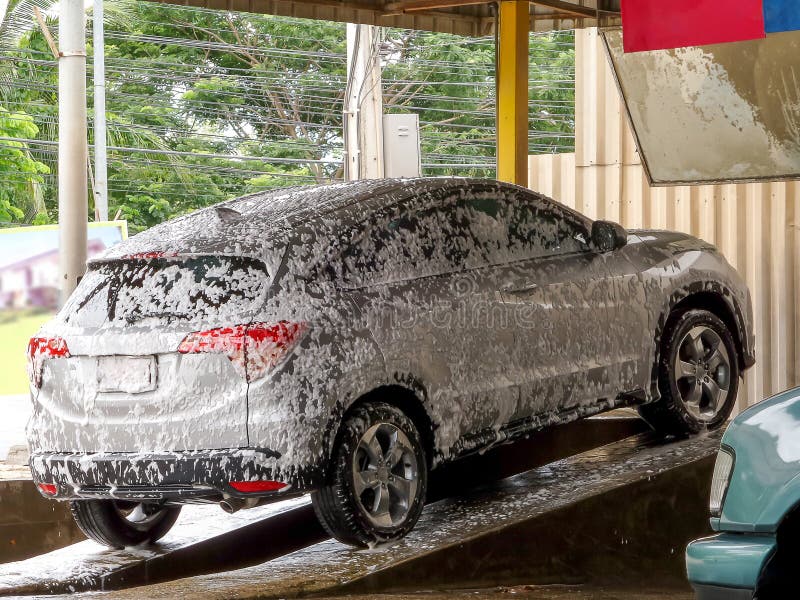 car wash with foam on ramp. car wash with foam on ramp
