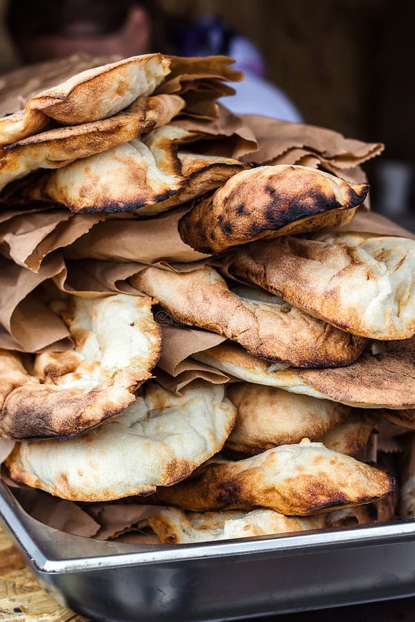 Lavash, Bakery Products fresh pastry sells pita market wheat tortillas close-up Caucasian kitchen Lavash Pita or Arabic bread trad stock photography Lavash, Bakery Products fresh pastry sells pita market wheat tortillas close-up Caucasian kitchen Lavash Pita or Arabic bread trad stock photography