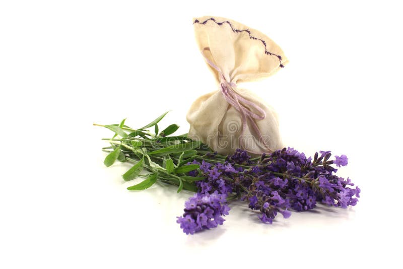 Lavender bag with flowers and leaves on a bright background