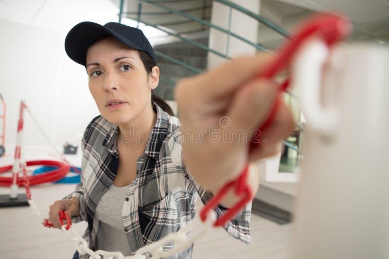 Lavoratrice in uniforme protettiva fotografia stock libera da diritti
