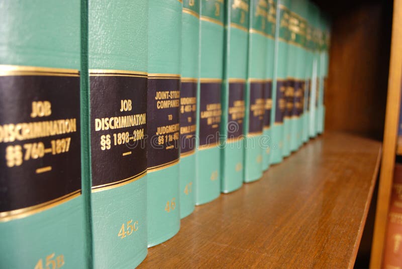 Close up of several volumes of law books of codes and statutes