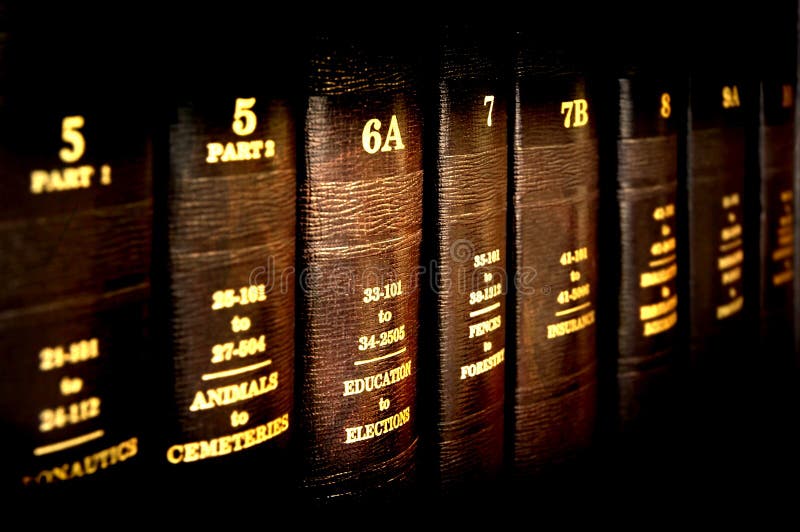 Close up of several volumes of law books on Education