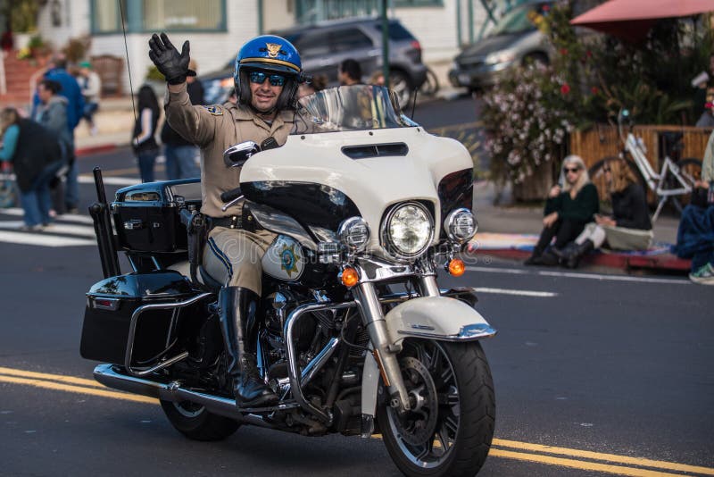 Law Enforcement Interacting with Parade Crowd with Smile. Editorial ...