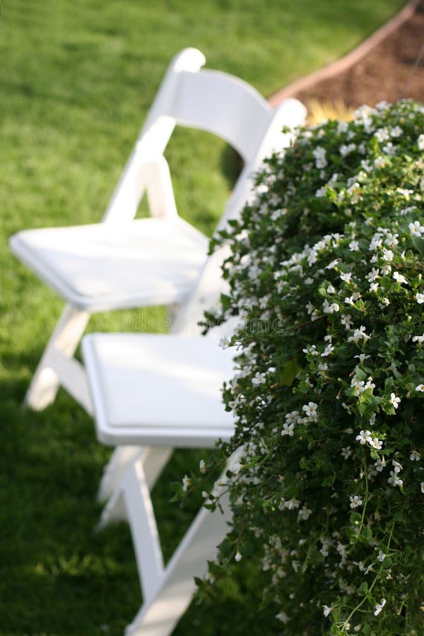 Lawn chairs in the grass stock photo. Image of spring 1087408